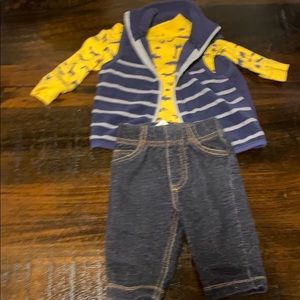 Safari wild animal vest and blue jeans that